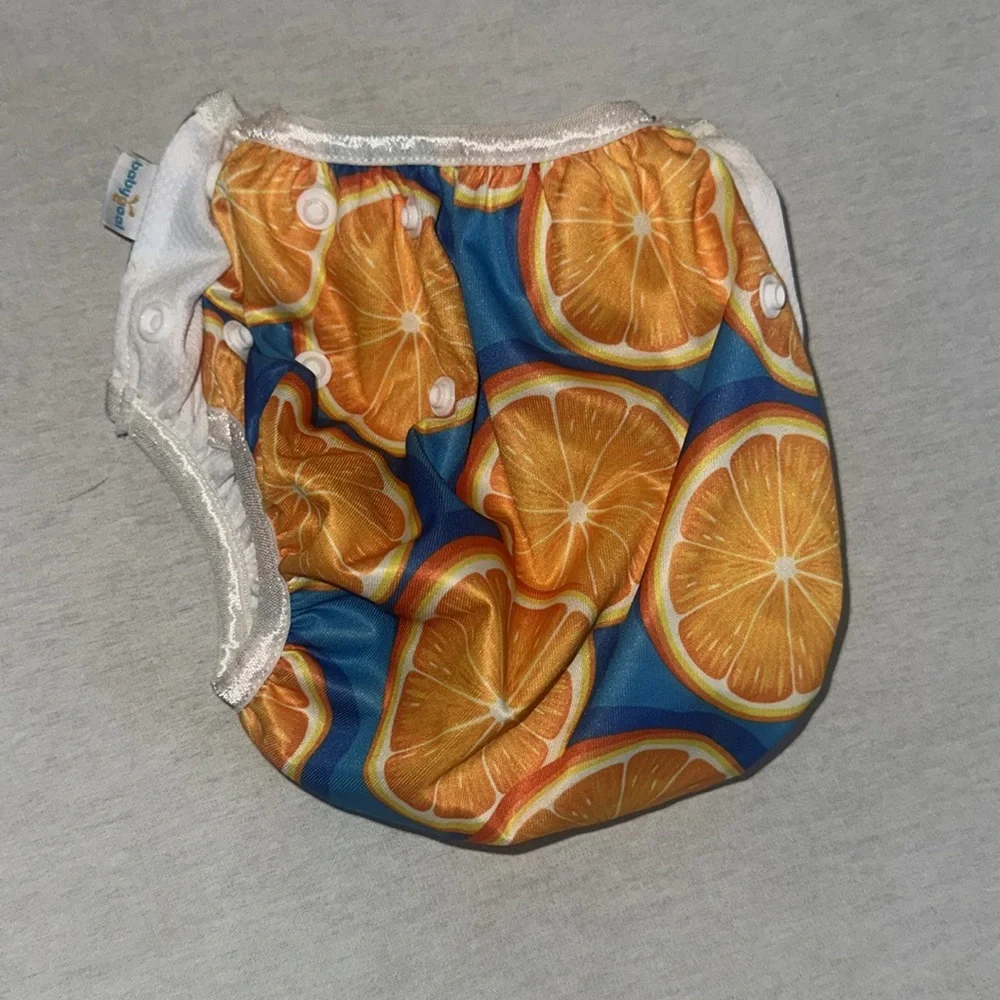 Kids OS Vibrant Orange and Blue Kids Diaper Cover.